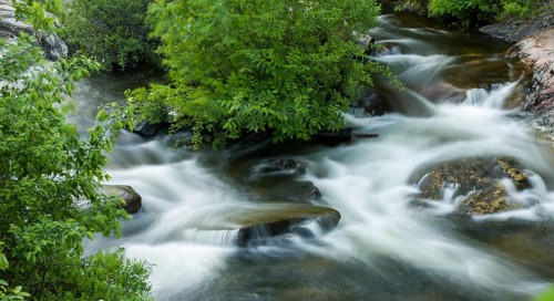 A slow shutter speed creates the feel of rushing water over rocks