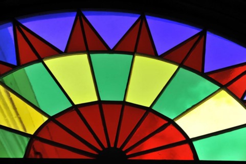 View of a colourful, wheel-shaped stained glass window with colourful segments, Havana, Cuba,