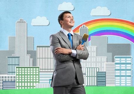 Confident and creative businessman painter standing with arms folded. Happy handsome man in
