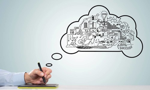 Hand of designer man working with tablet and business sketches at background