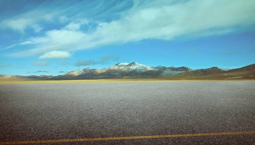 View of the empty asphalt road with beautiful mountain landscape