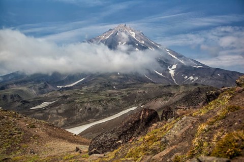 Mountains and volcanoes. Beautiful landscape of Kamchatka Peninsula: summer panoramic view of