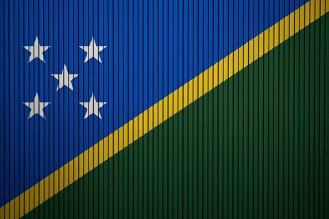 Solomon Islands Flag painted on the cracked grunge concrete wall