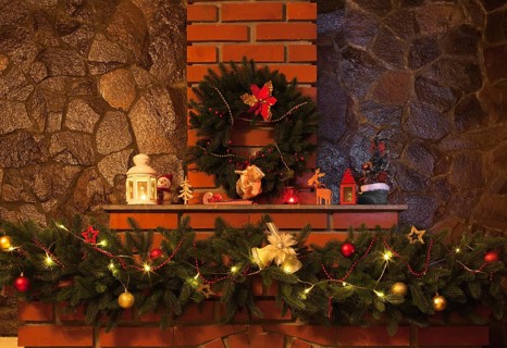 Christmas wreath and garland on the fireplace