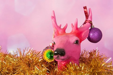 Christmas reindeer with golden ornaments