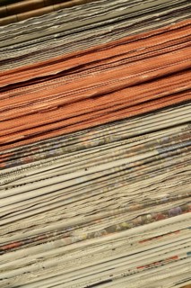 Stack of newspapers in the is intended to emphasise the importance of print media