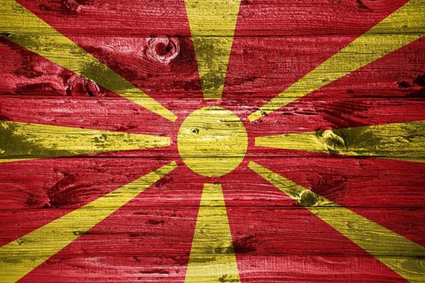 North Macedonia flag on wooden planks background wood flag