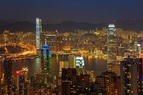 Hong Kong at night. View of Victoria Harbour and Hong Kong Central. Taken from Victoria Peak