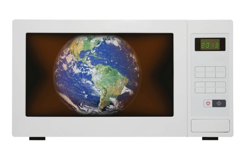 Global warming concept, earth in microwave