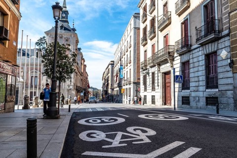 Madrid, Spain, November 1, 2020: Mixed traffic lane for bicycles and cars with a maximum limit of
