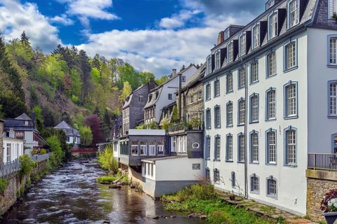 Picturesque houses along the Rur River in the historic center of Monschau, Germany, Europe