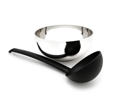 Soup Ladle Near the Metallic Bowl Against the White Background Riga, Latvia, Europe
