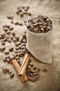 Coffee beans in bag with cinnamon