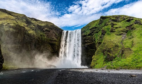 Skogafoss waterfall in southern Iceland during a summer day