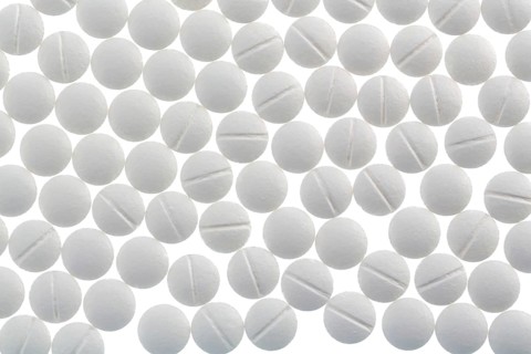 White tablets, symbolic photo for medicine, remedies and tablet addiction Austria