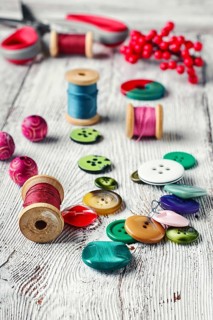 Set of bright beads, threads and decorative items for making jewellery