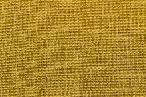 Rustic canvas fabric texture in yellow colour and tweed pattern