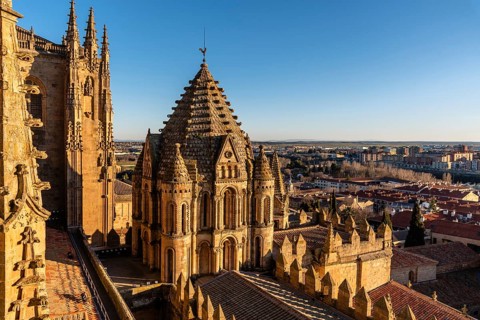 Exterior view of the dome of the Old Cathedral of Salamanca a blue sky day. Castilla y Leon, Spain,