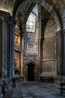 Avila, Spain, 8 April, 2024: interior view of the Avila Cathedral with its bloodstone walls, Europe