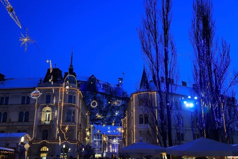 The Three Bridges over the Ljubljanica River, Ljubljana Castle at dusk at Christmas time, Ljubljana