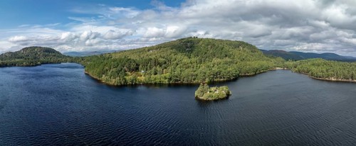 Loch at Eilein Castle, loch with island with castle ruins, drone shot, Rothiemurchus, Cairngorms