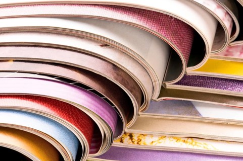 Stack of open magazines