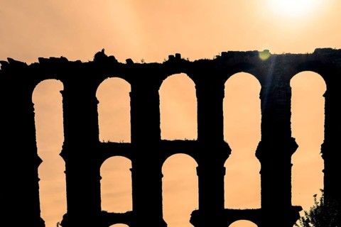 The Acueducto de los Milagros English: Miraculous Aqueduct is the ruins of a Roman aqueduct bridge,