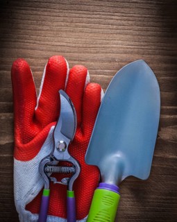 Protective glove steel gardening pruning shears and trowel agriculture concept