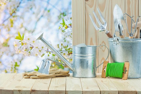 Garden articles on wooden table in garden
