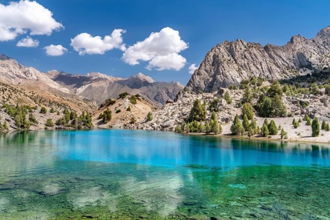 The beautiful mountain trekking road with clear blue sky and rocky hills and the view of Alaudin