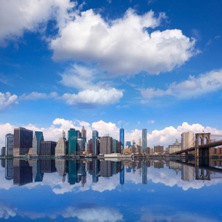 Brooklyn Bridge and Manhattan skyline New York city sunshine US