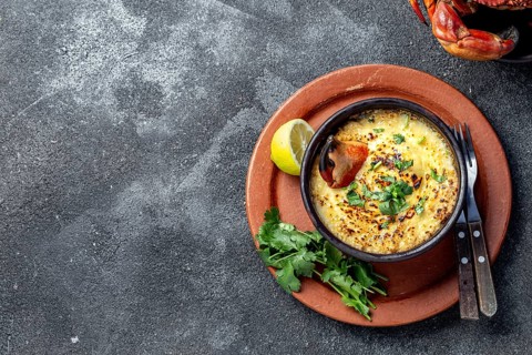 Food, CHILEAN FOOD. Baked crabmeat crab meat with cheese, cream and bread. Traditional dish of