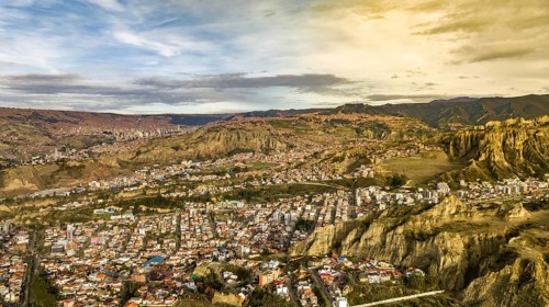 La Paz, Bolivia, aerial view flying over the dense, urban cityscape. San Miguel, southern distric.