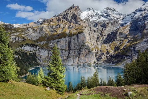 Amazing turquoise Oeschinnensee in Swiss Alps, Kandersteg, Bernese Oberland, Switzerland, Europe