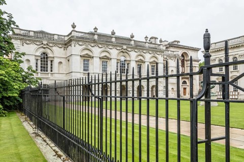 CAMBRIDGE, UK, AUGUST 11, 2015: Iron fence in a College of the University of Cambridge. Cambridge