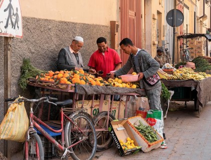 Taroudant, Morocco, 21 March, 2024: greengrocer selling fruit from his pushcart in the streets of