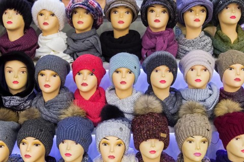 Moscow, Russia, Decembet 15, 2019: Mannequin heads in knitted hats and scarves, Europe