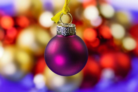Closeup of an hanging purple christmas ornament