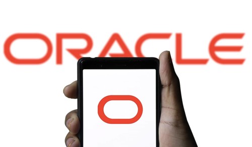 ORACLE logo displayed on smartphone screen. ORACLE is a multinational computer technology