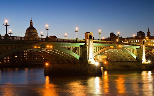 Illuminated Southwark Bridge at the blue hour, London, England London, England