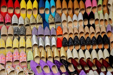 Meknes, Morocco, Africa, Colourful shoes in a variety of colours and patterns on display, On the