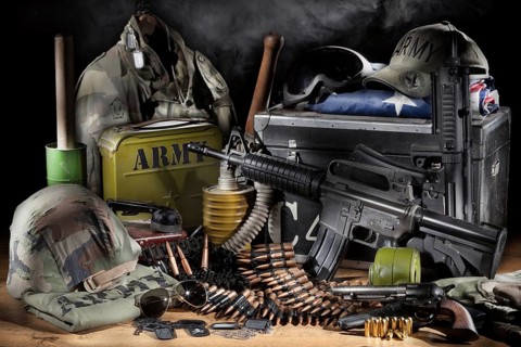 Still life with weapon, army clothing and different equipment
