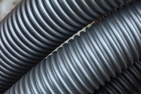 Zwei Hoover-Rohre im Detail als Hintergrund