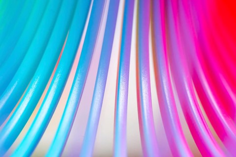 Details of a rainbow coloured plastic toy