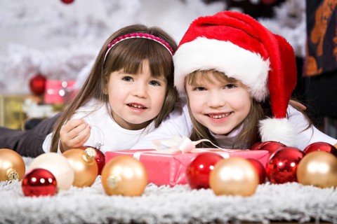 Little girl geting a Christmas gift