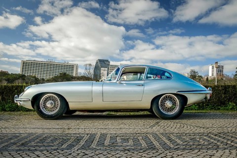 Lisbon, Portugal, Jan 20, 2024: Full side view of classic silver E-Type Jaguar Series 3 coupe car