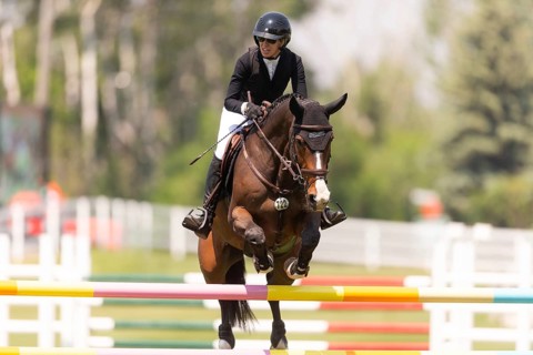 Amy Millar of Canada and riding Jagger HX, compete in the 1.60m Grand Prix during The Continental