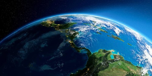 Highly detailed Earth with atmosphere, exaggerated relief and light-flooded cities. Transition from