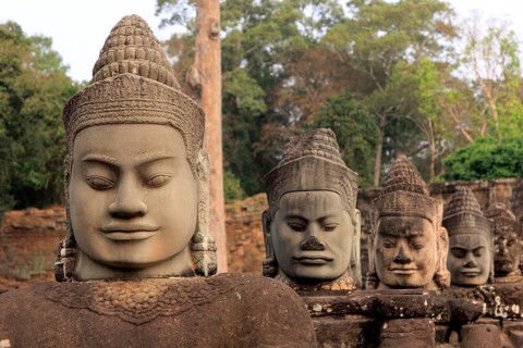 Balustrade with stone gods and demons on the bridge to the southern Tor tor of Angkor Thom