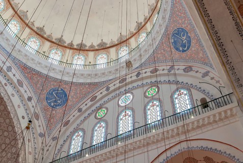 A picture of the colorful and gorgeous interior of the Beyazit Mosque, in Istanbul